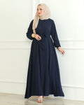 Navy Blue A-line abaya with concealed front zipper and tie belt, paired with a beige hijab – three-quarter front view