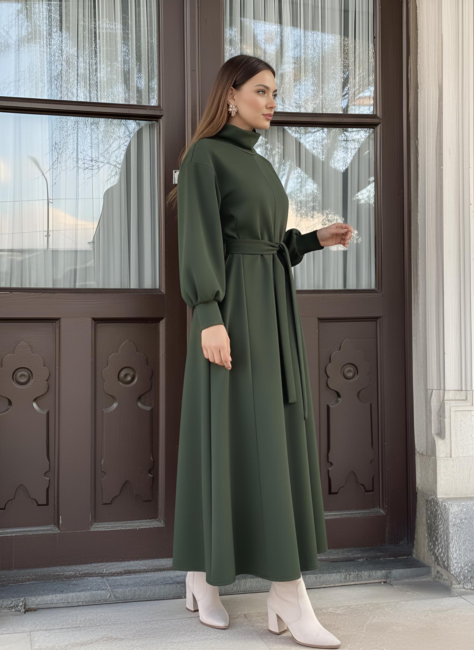 Full-length green modest dress with flowing A-line skirt in thick scuba fabric