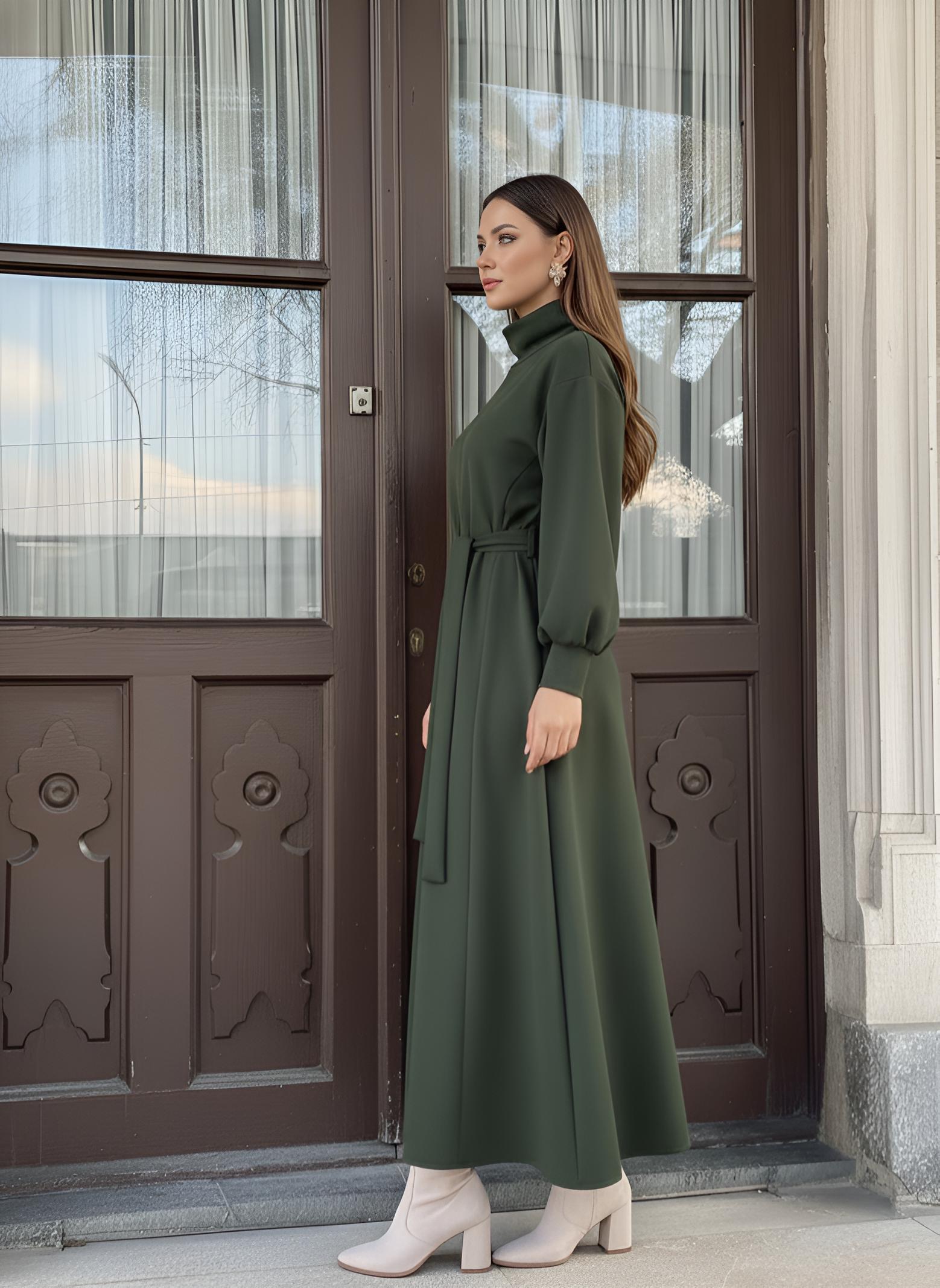 Green belted turtleneck dress styled for winter modest wear