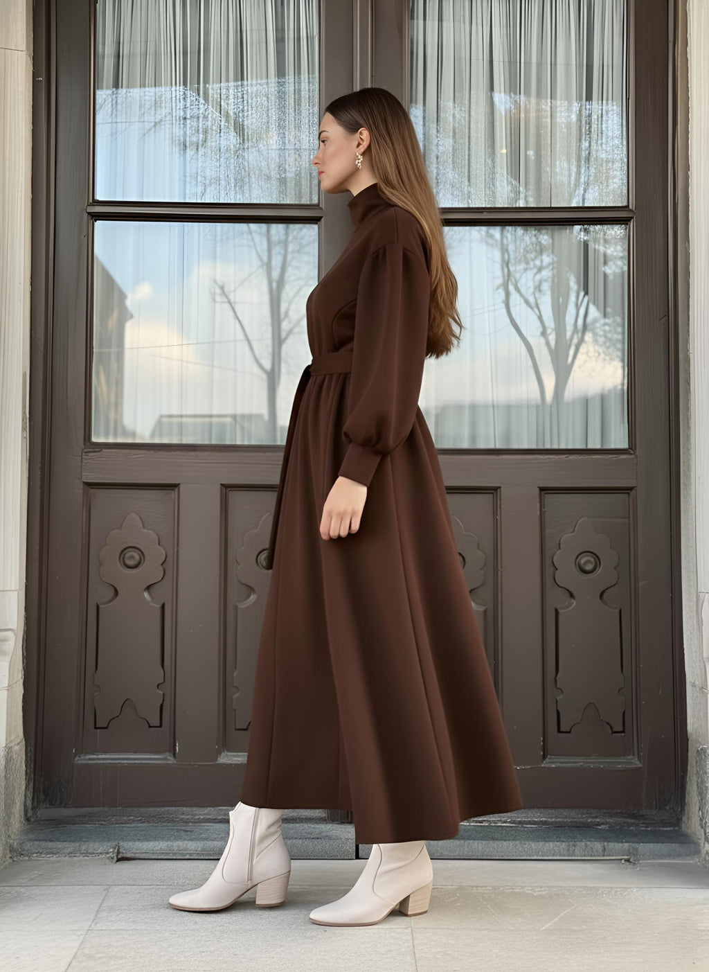 Close detail of brown modest dress sleeve with elasticated cuff