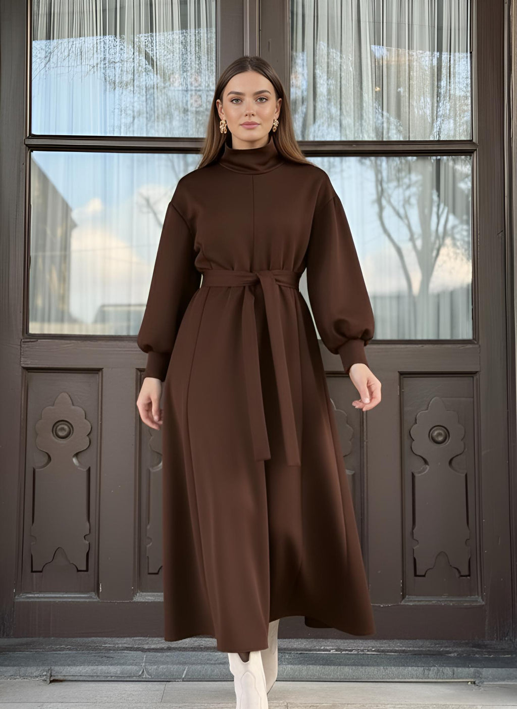 Brown belted turtleneck dress styled for winter modest wear