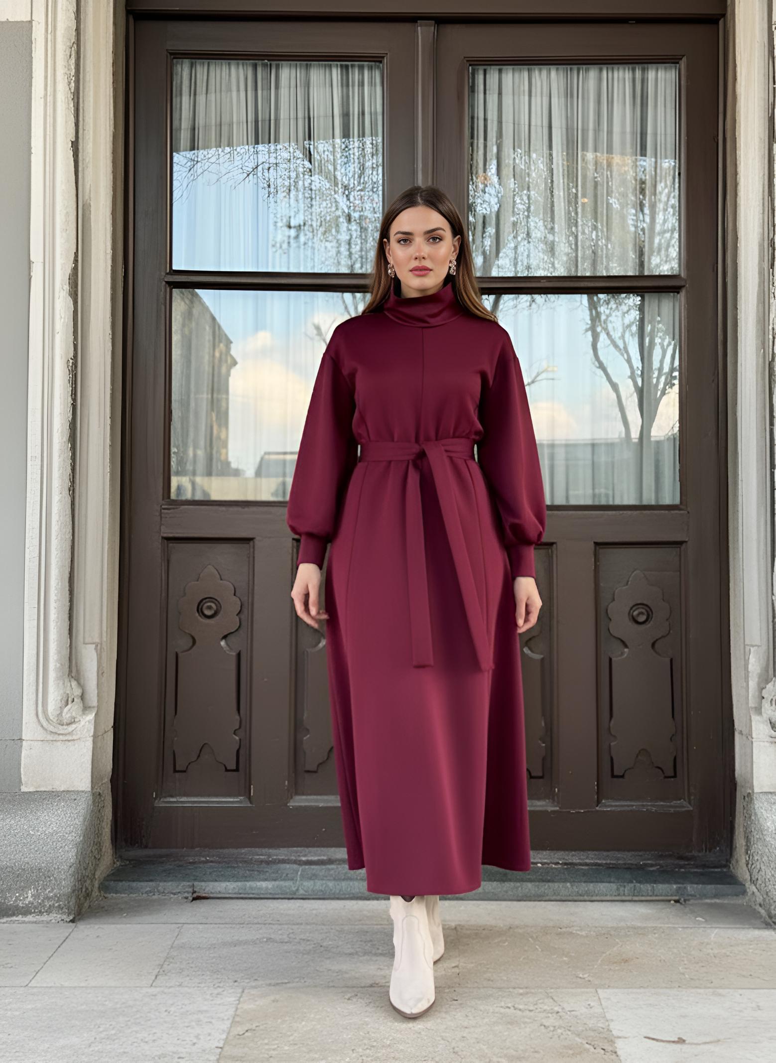 Close detail of red modest dress sleeve with elasticated cuff
