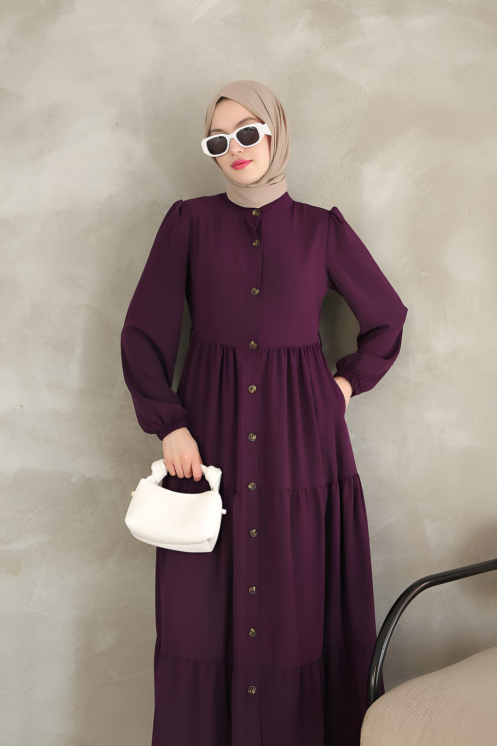 Side view of purple button-down modest maxi dress showing tiered ruffled skirt