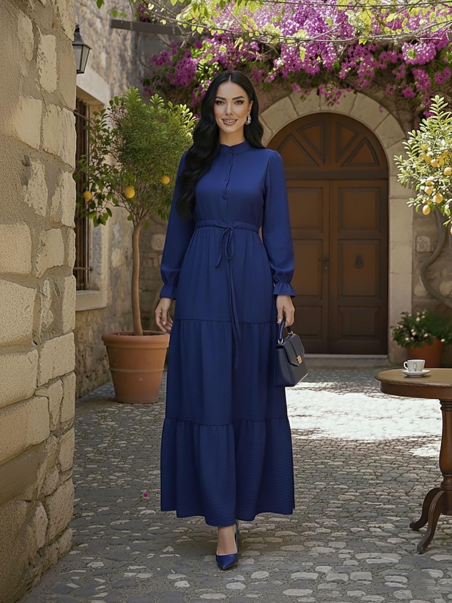 Close-up of navy maxi dress mock neck with button placket detail