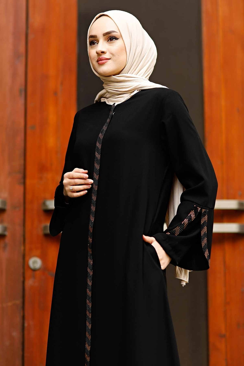 Black rhinestone-trim abaya close-up showing sparkling front zipper panel and flared cuff embellishment – Istanbul Styles
